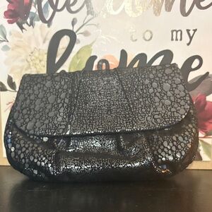Chic Textured Black Clutch by inge Christopher